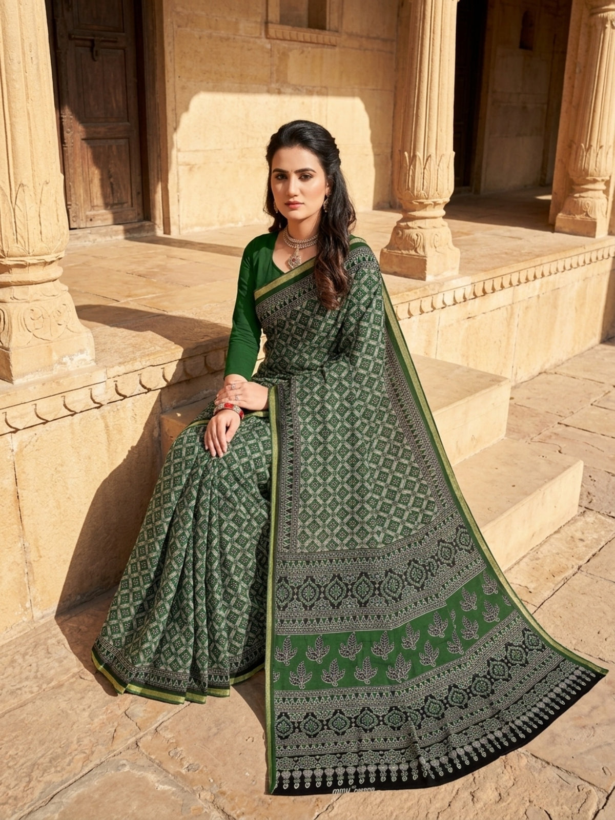 Minu Fashions Kanishka Green Pure Cotton Ajrakh Printed Saree with Gold Zari Border