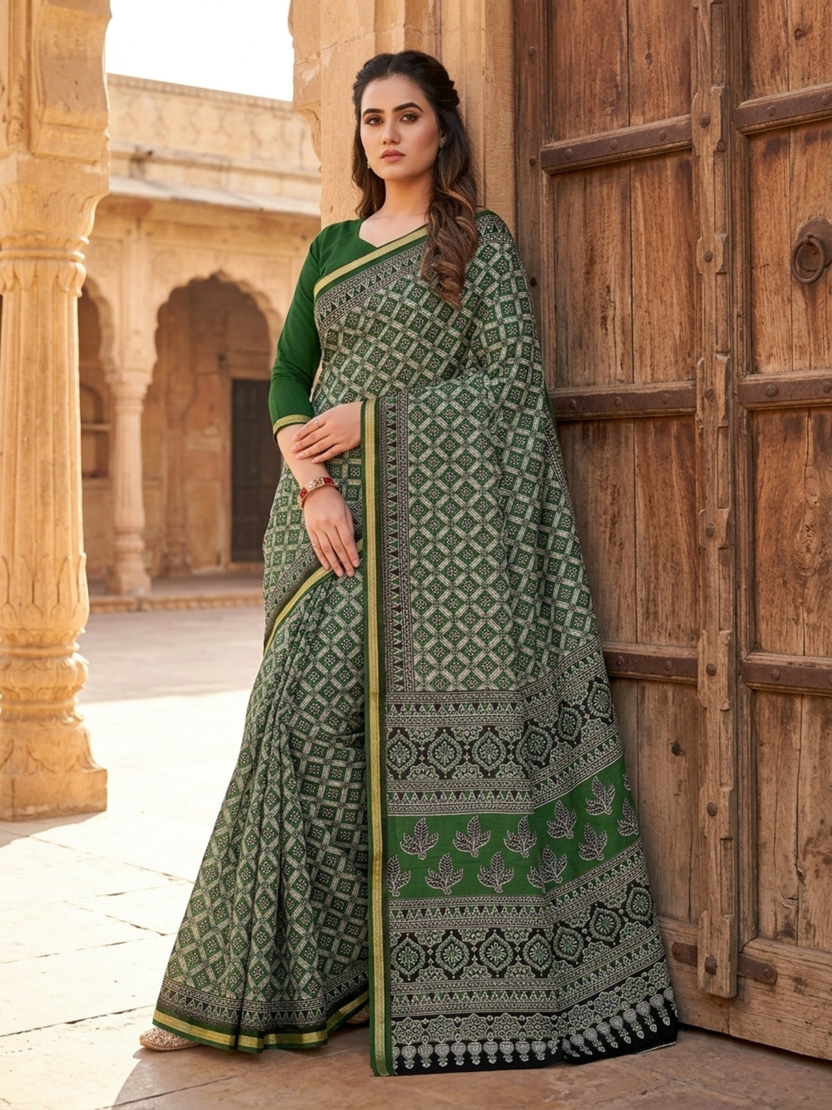 Minu Fashions Kanishka Green Pure Cotton Ajrakh Printed Saree with Gold Zari Border