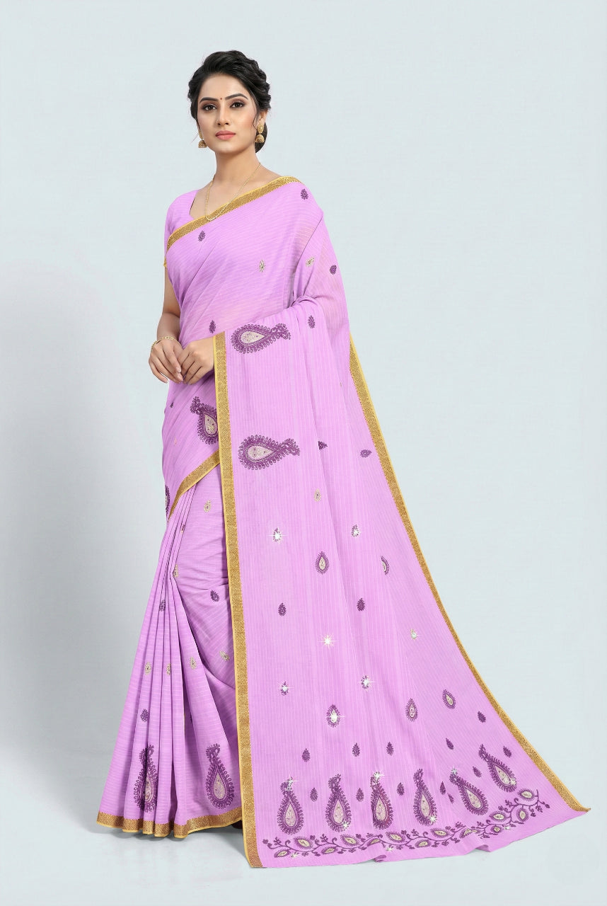 Woman wearing a pink saree with gold border on a white background