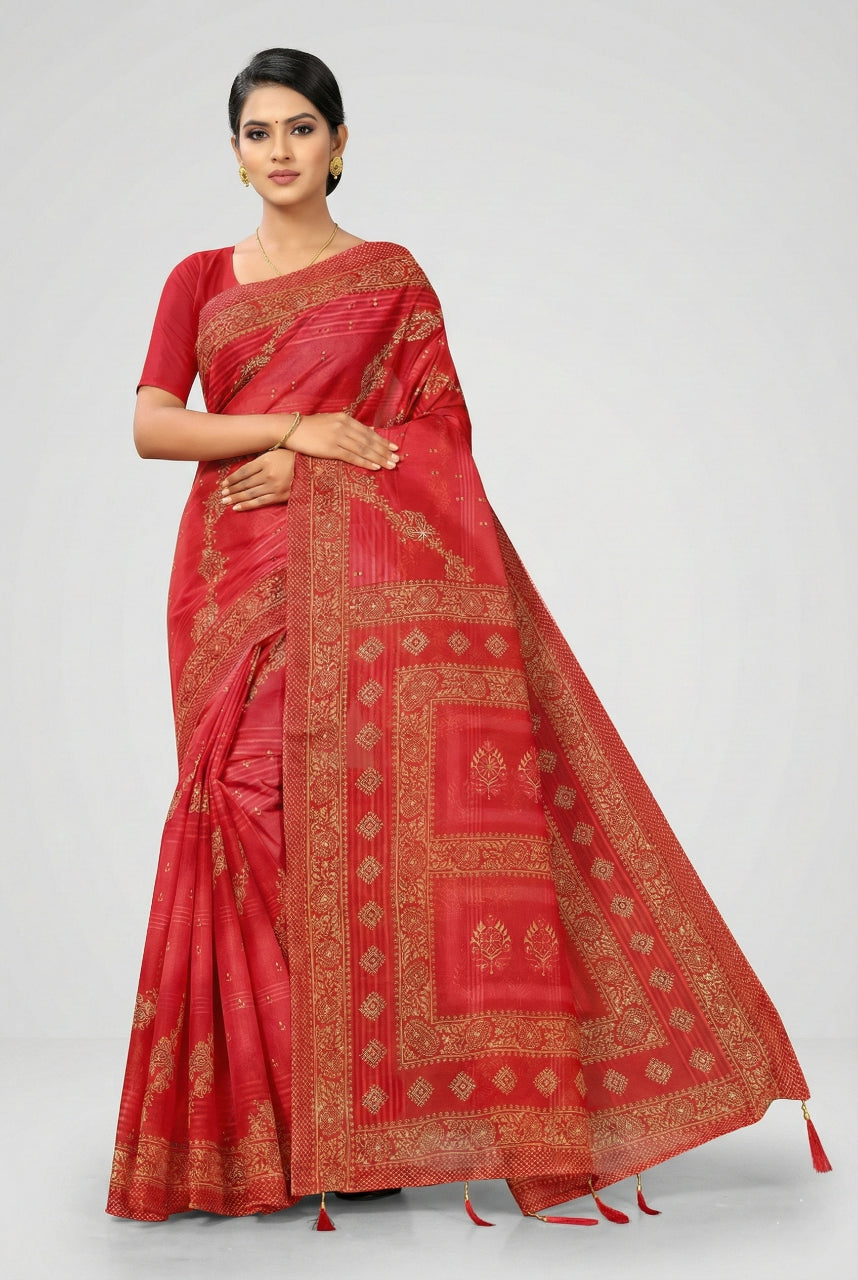 Red saree with gold patterns worn by a model on a white background
