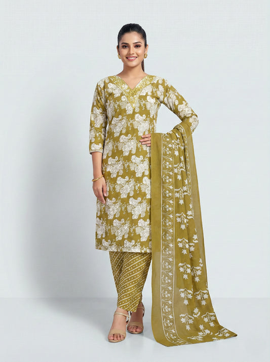 Woman wearing a yellow floral outfit with a white background